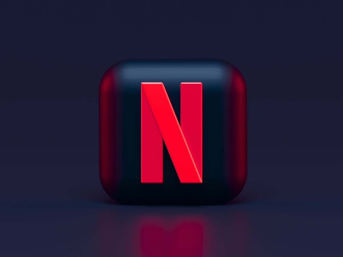 Marketer reviewing a social media analytics dashboard on a laptop