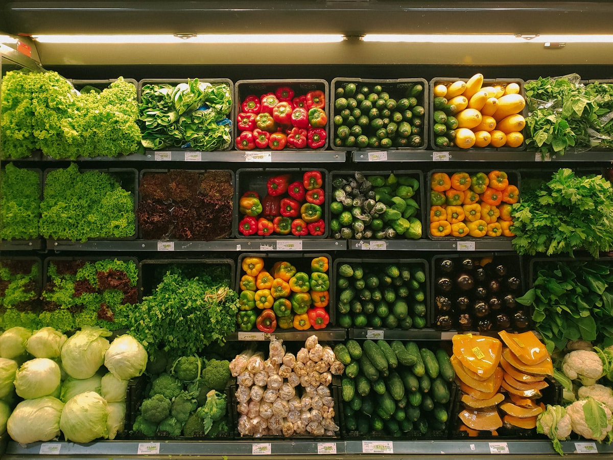 Fresh vegetables displayed in crates, the kind of produce that depends on an unbroken cold chain for export