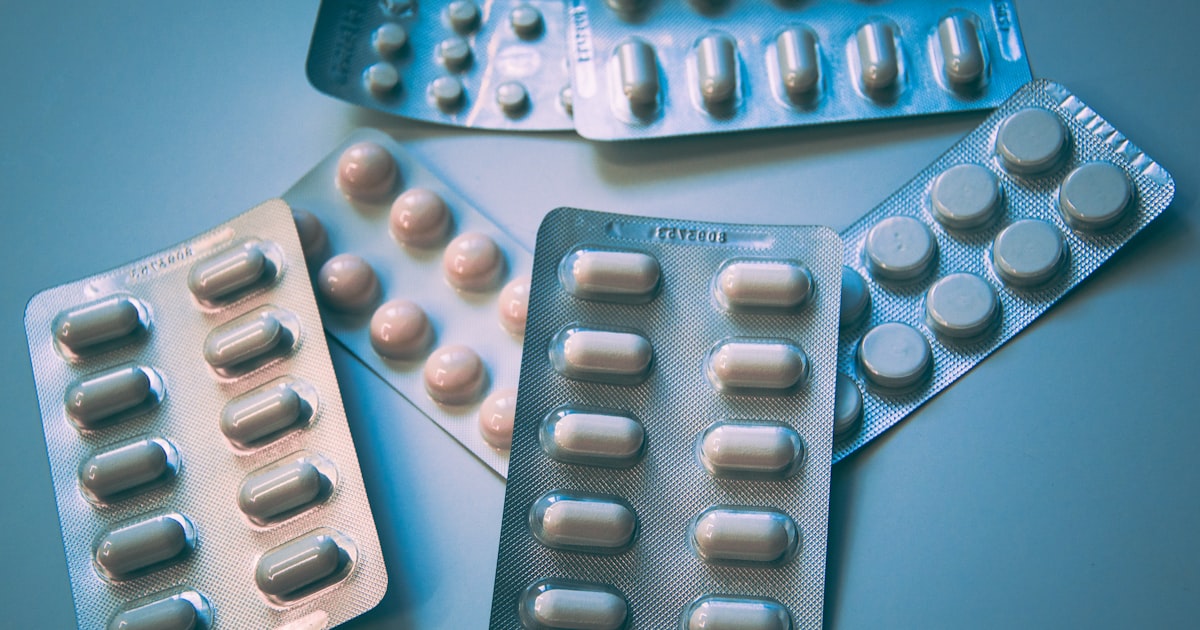 Assorted supplement capsules representing the broad vitamin and supplement range found at retailers like Vitamin Shoppe