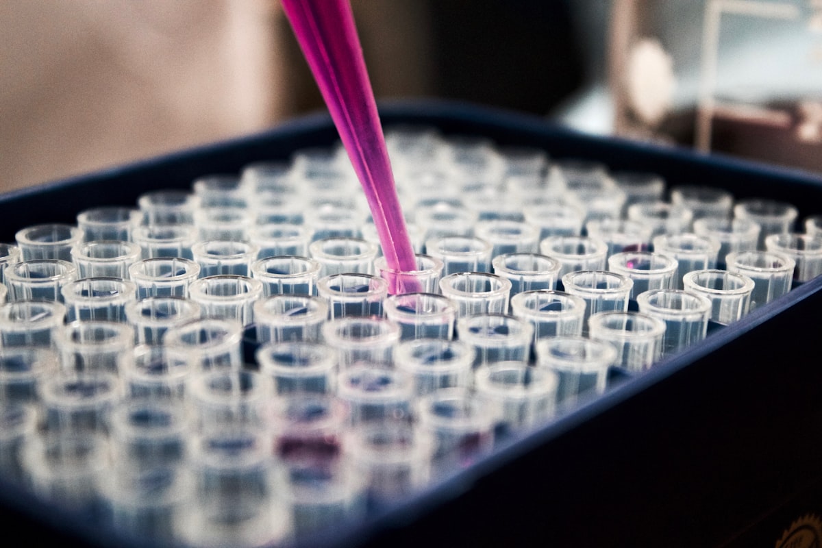 Research scientist working with laboratory equipment during product formulation