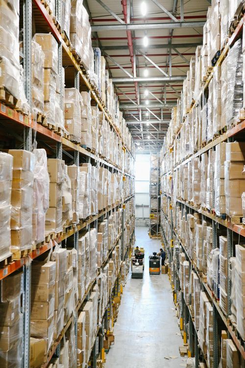 Warehouse shelves filled with boxes and inventory ready for distribution