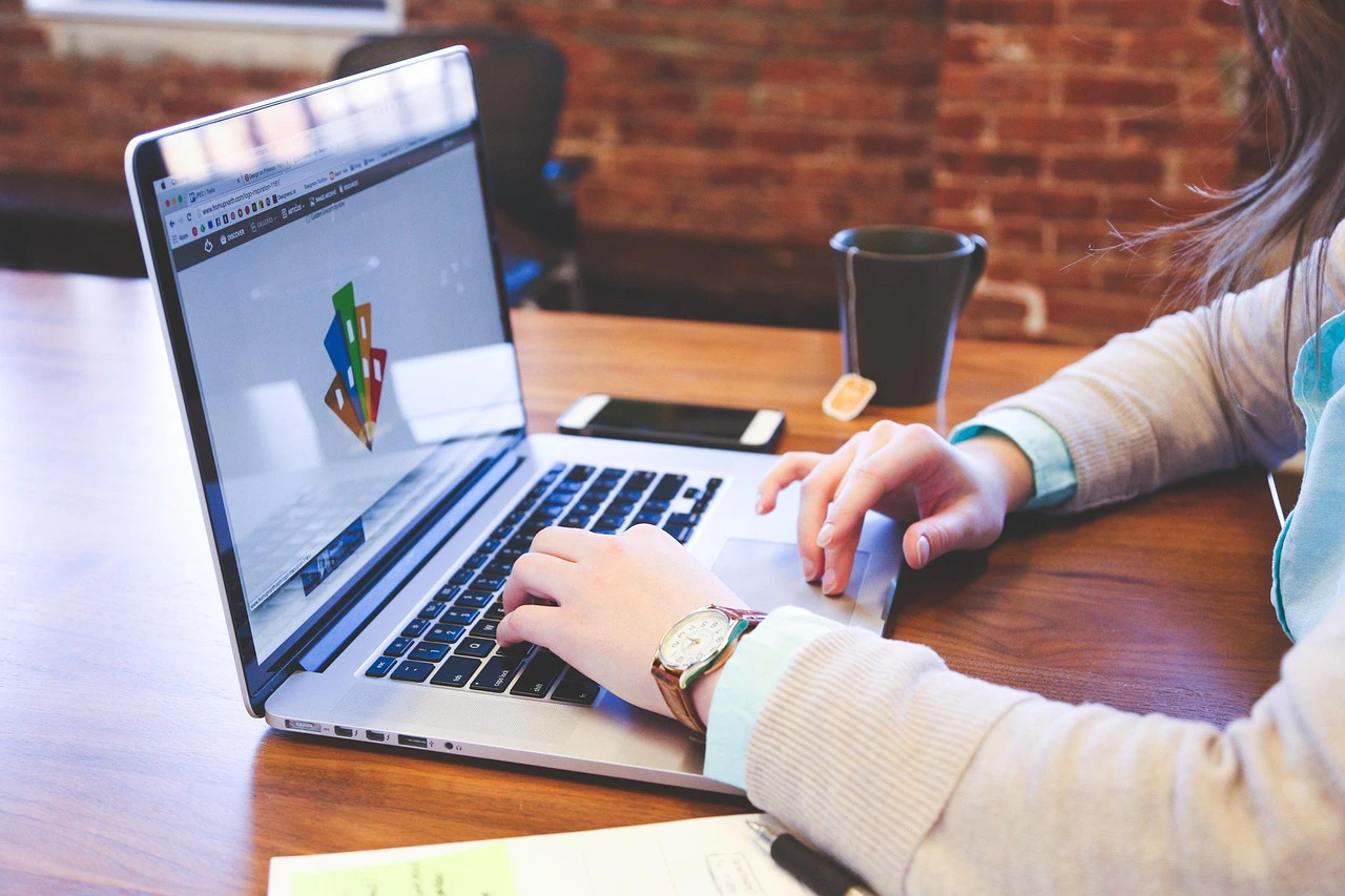 Laptop and workspace for managing social media