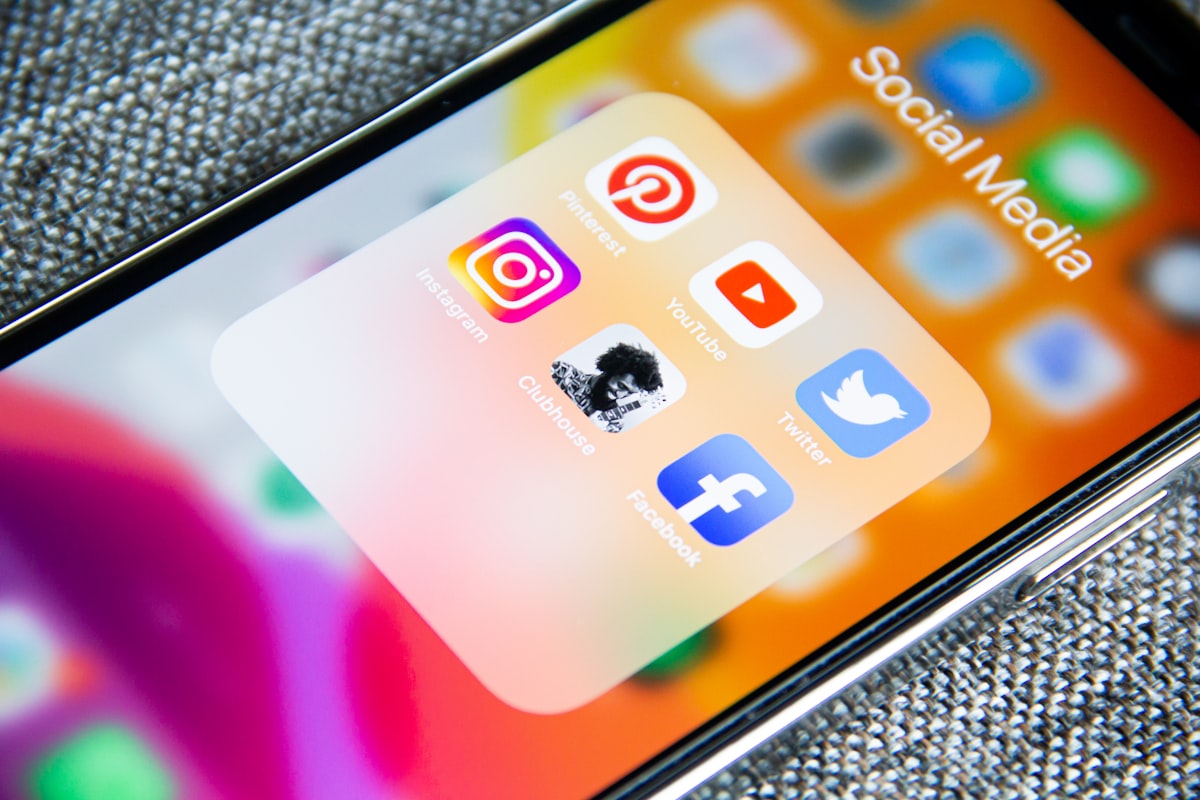Smartphone displaying social media notifications and analytics