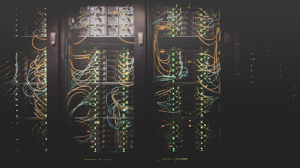 Blue-lit server room representing cloud storage infrastructure.