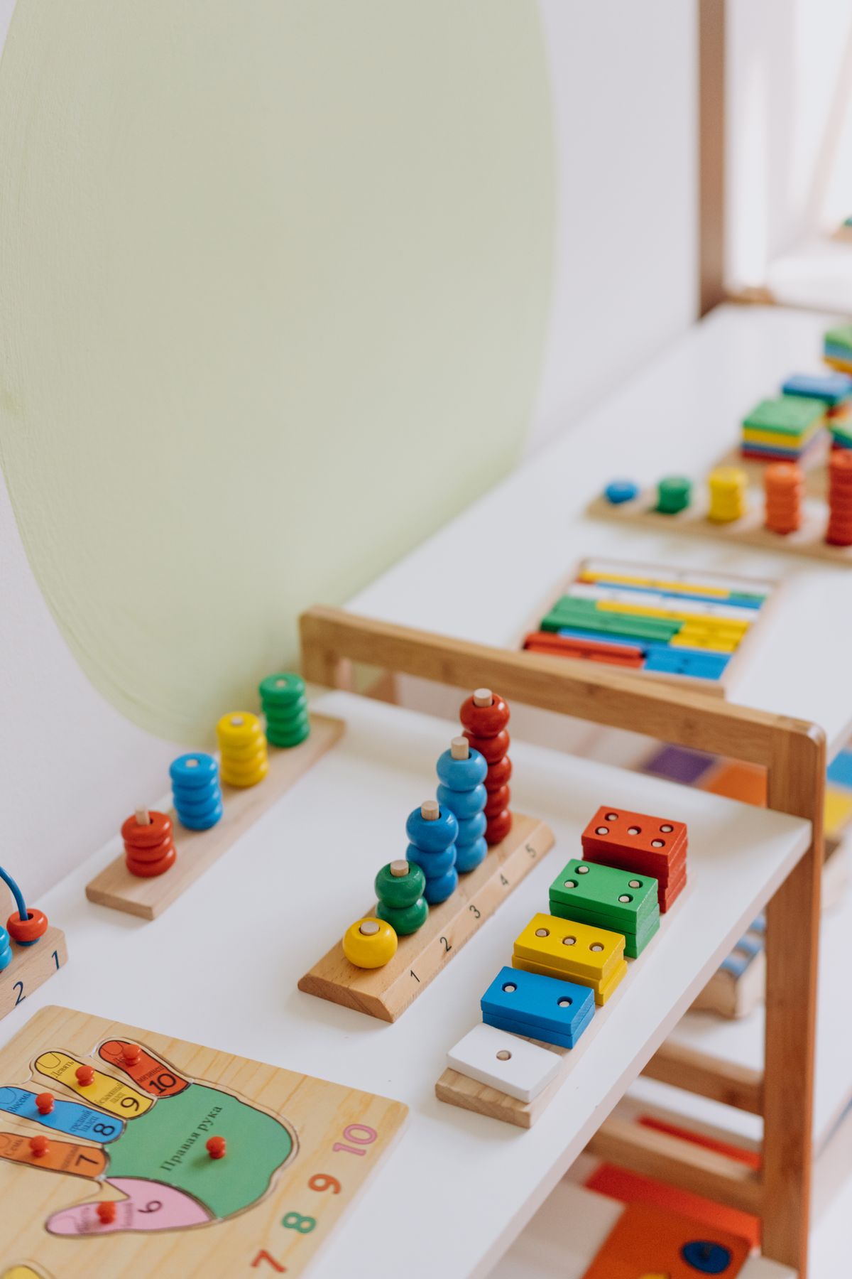 Colorful wooden educational toys arranged on a table