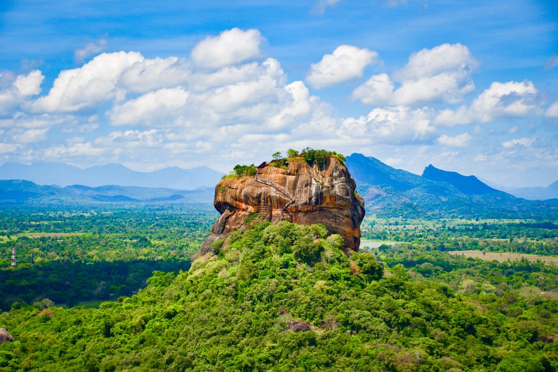 Sigiriya Lion Rock fortress rising above the jungle canopy in Sri Lanka