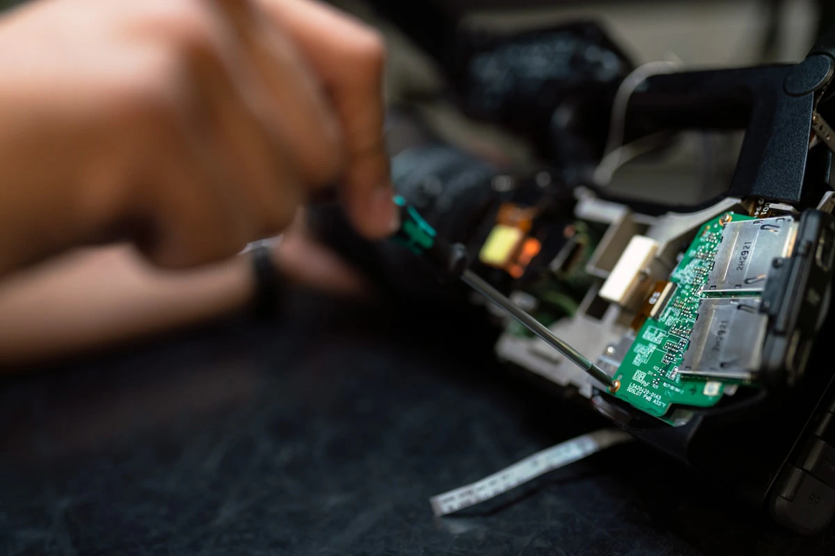 IT professional performing maintenance on server hardware