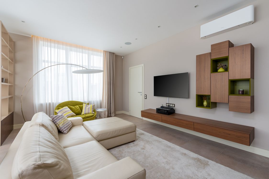 Comfortable modern sofa in a stylish living room with natural light
