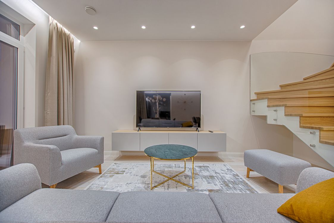 Calm minimalist interior with natural light and simple furniture