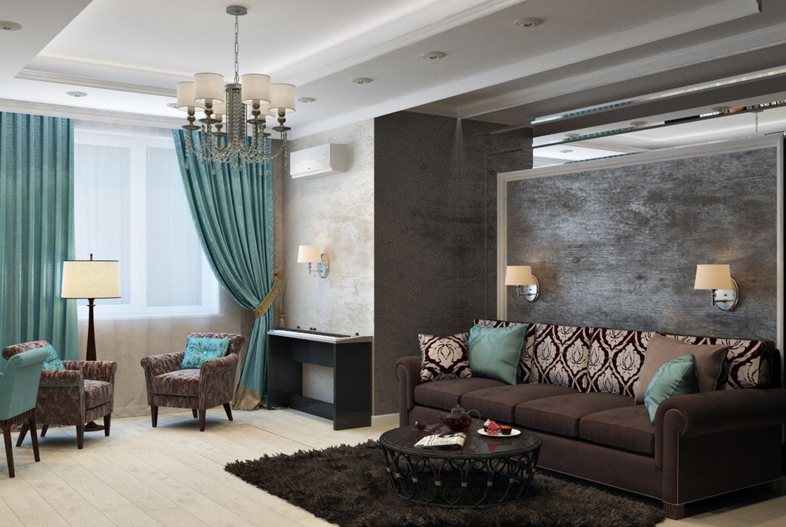 Contemporary living room with a sofa, armchairs, and warm lighting