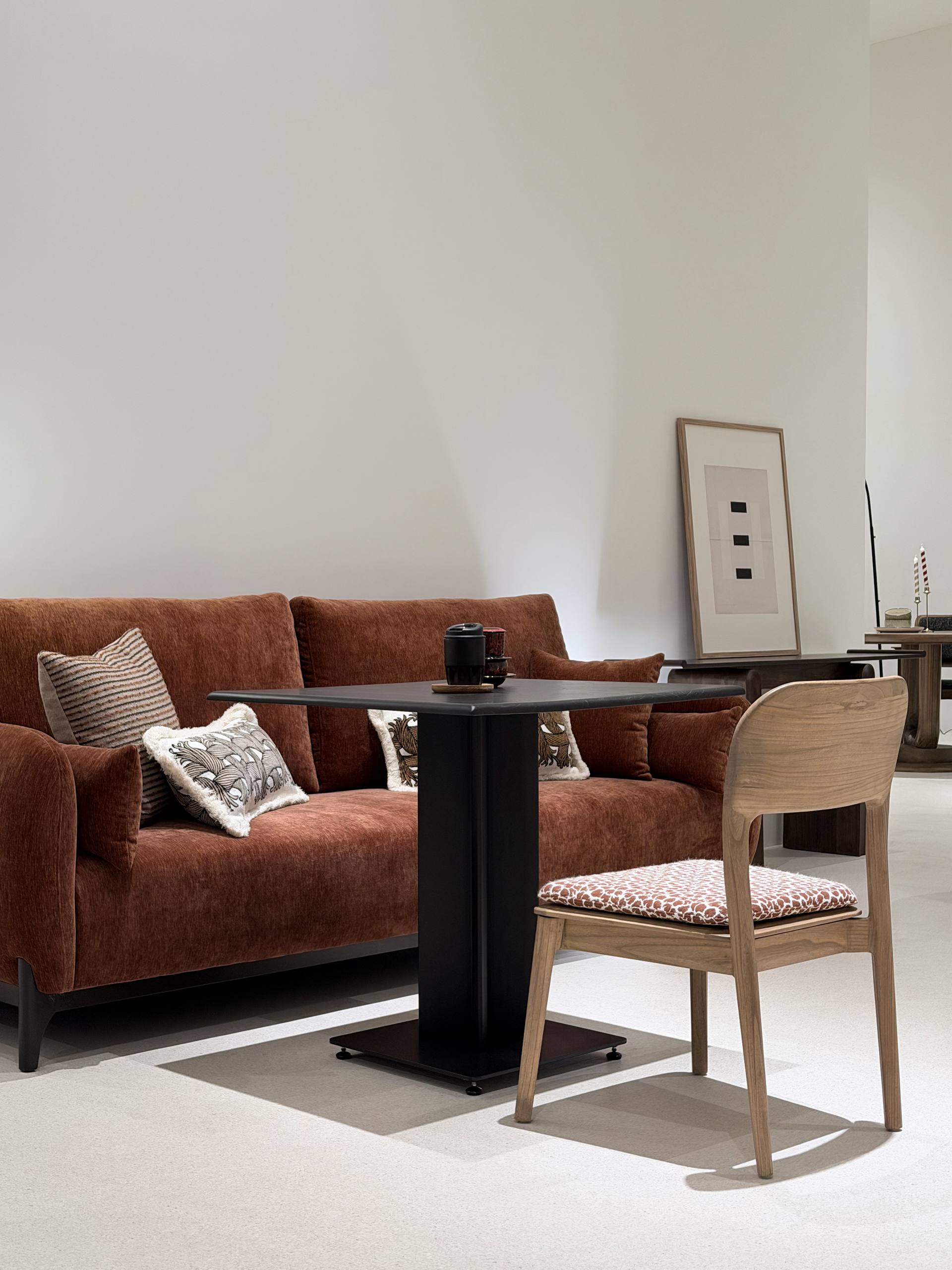 Spacious open-plan living room with modern furniture in neutral tones