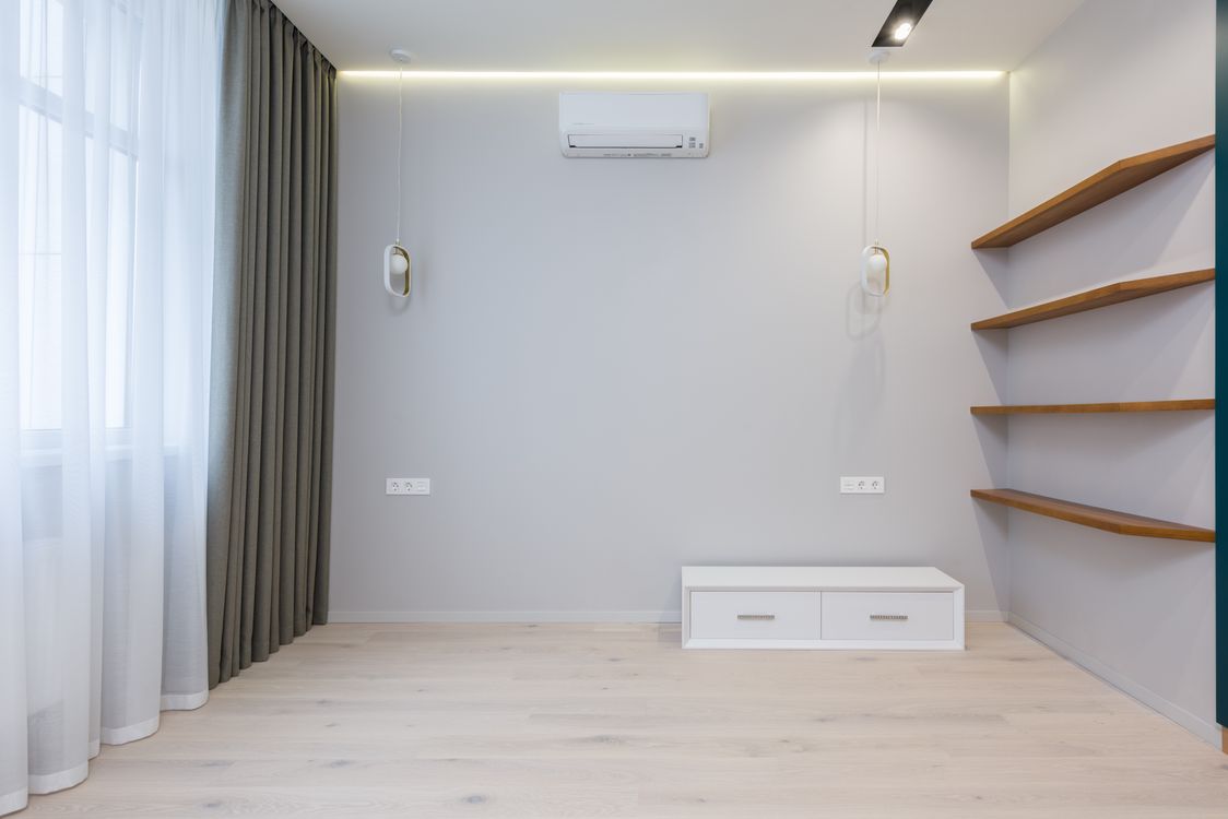 Minimalist living room with warm wood and neutral tones