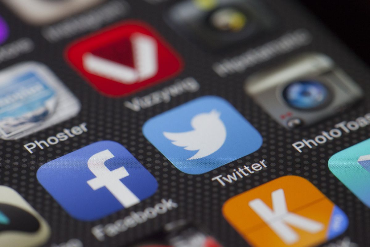 iPhone home screen showing social media application icons including Instagram