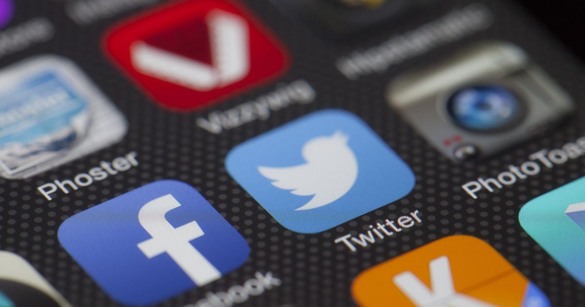 Smartphone displaying social media app icons including Instagram