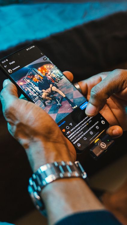 Person browsing Instagram on a smartphone