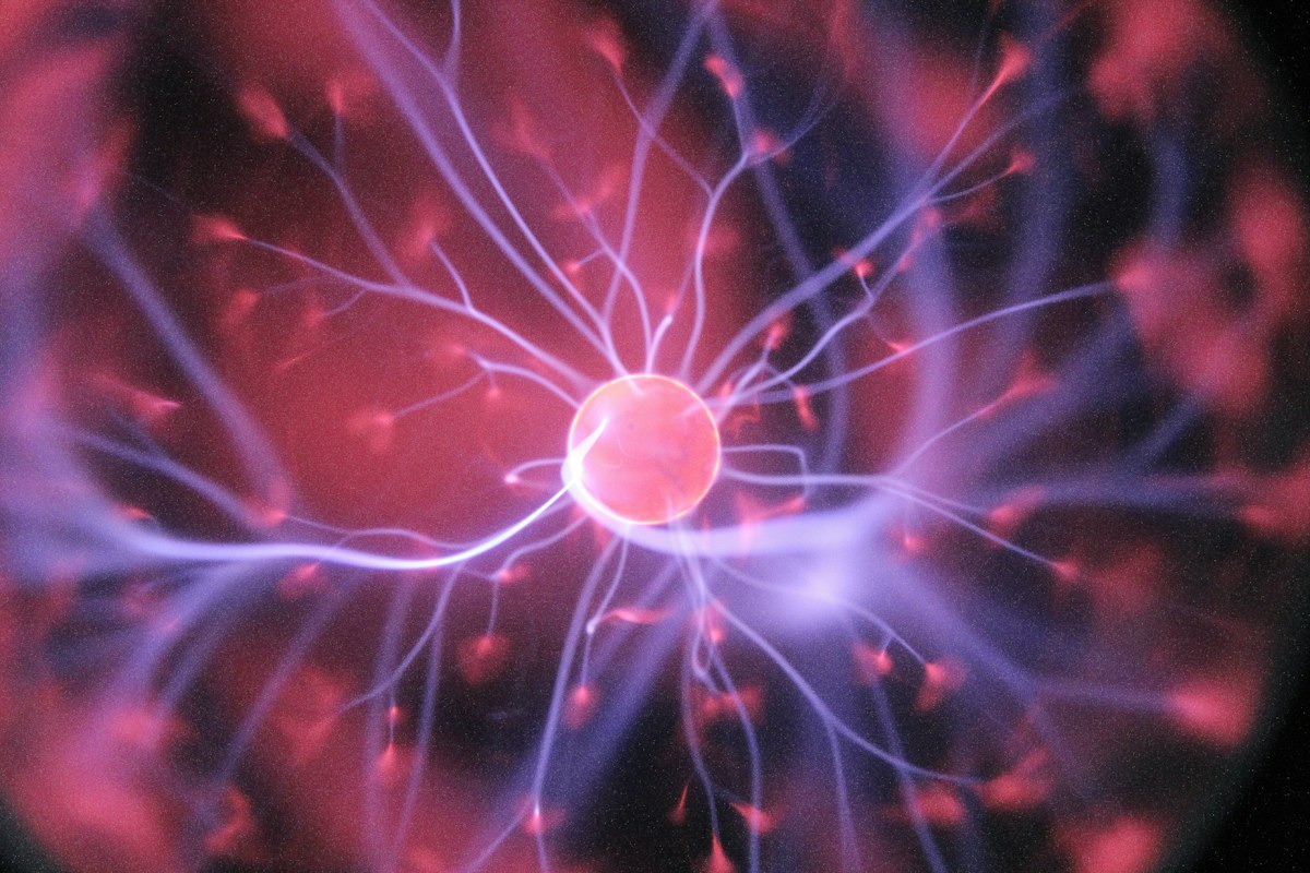 Ondas abstractas de luz que representan fenómenos cuánticos y la dualidad onda-partícula