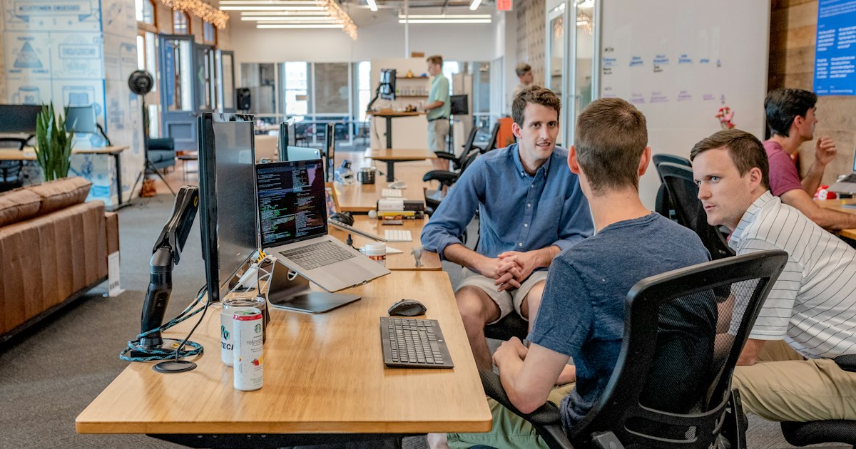 Business professionals collaborating around a conference table during a corporate meeting