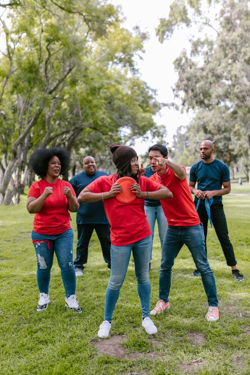 Group of people in a friendly team building exercise