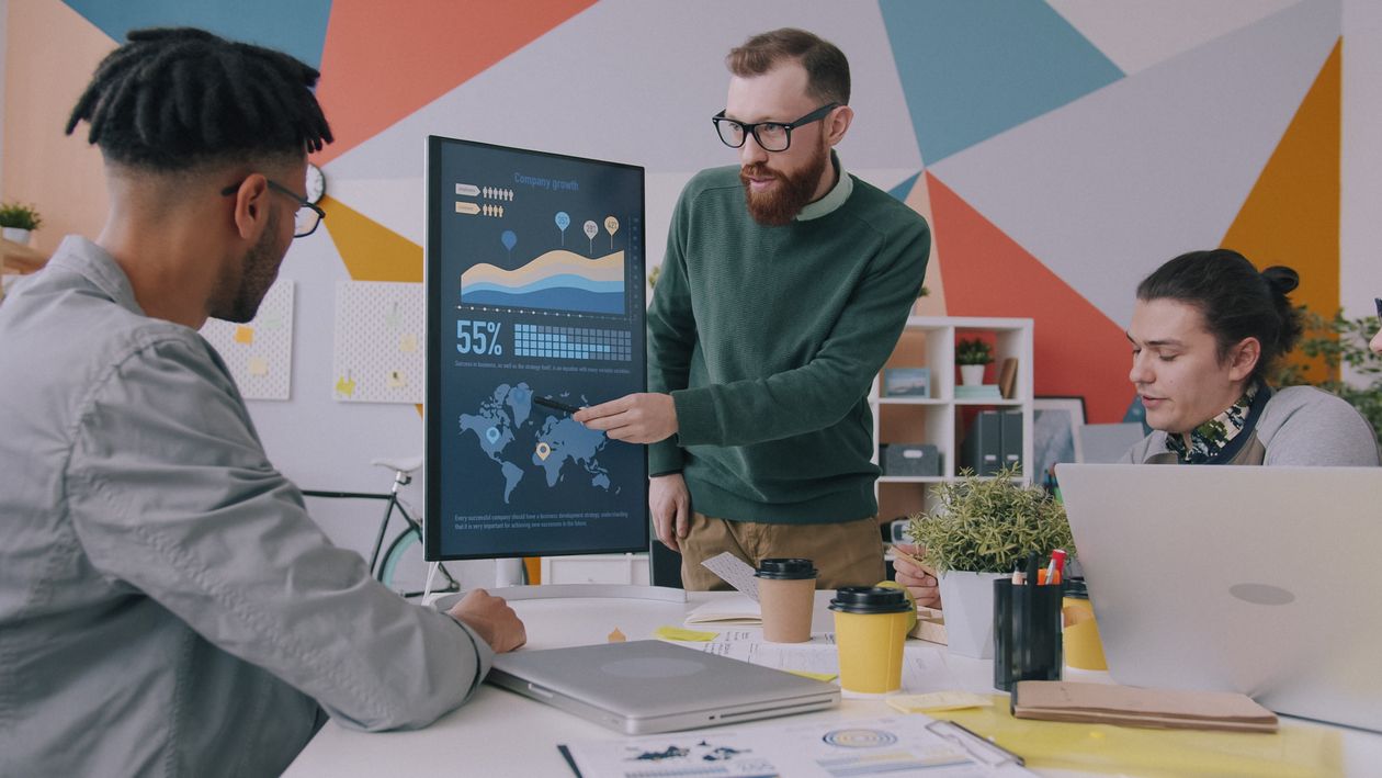 Operations team analyzing connected business systems and approvals