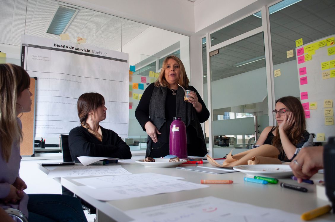 Diverse team of professionals collaborating during a meeting in a modern office setting