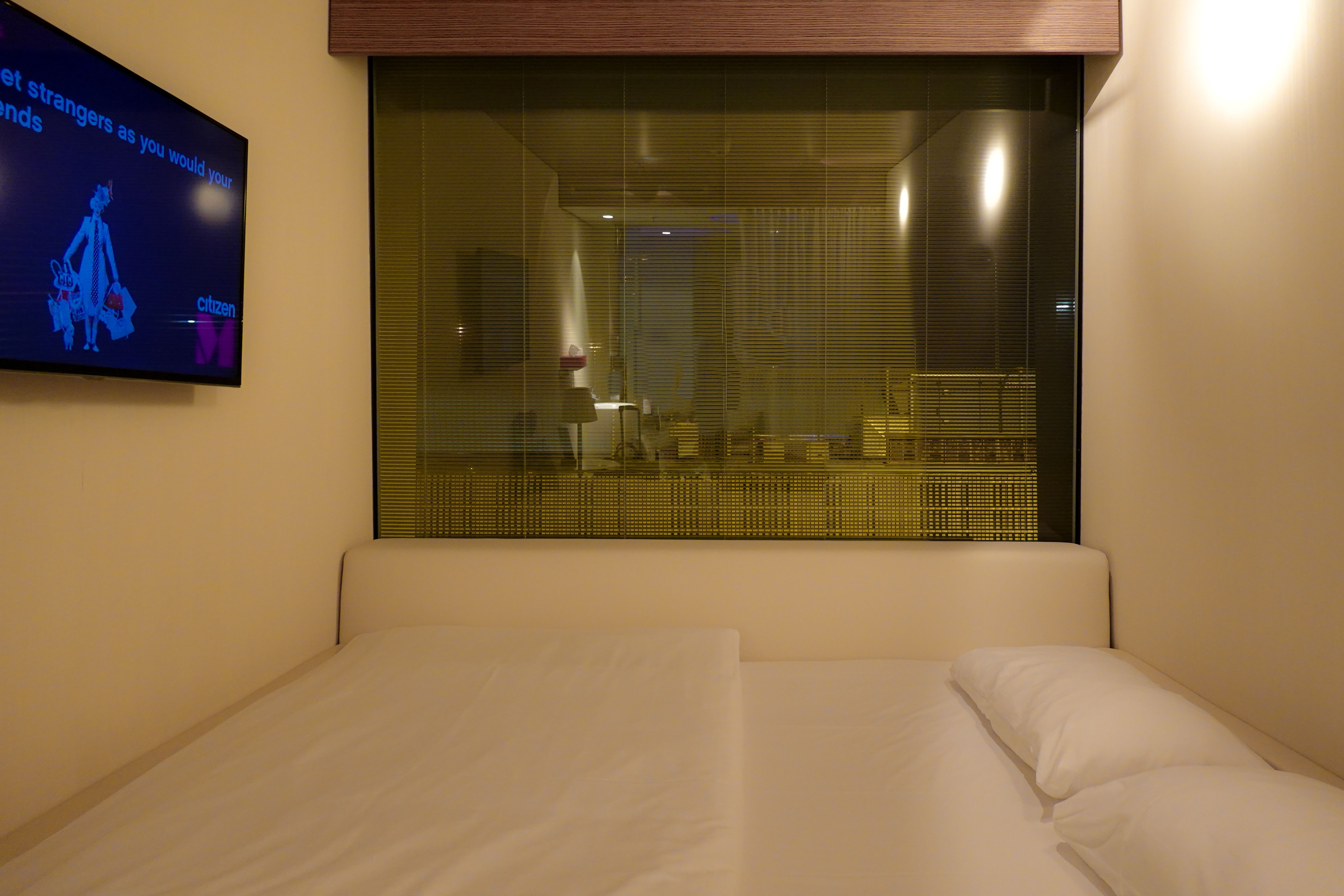 Contemporary minimalist hotel guest room with neutral tones and modern decor