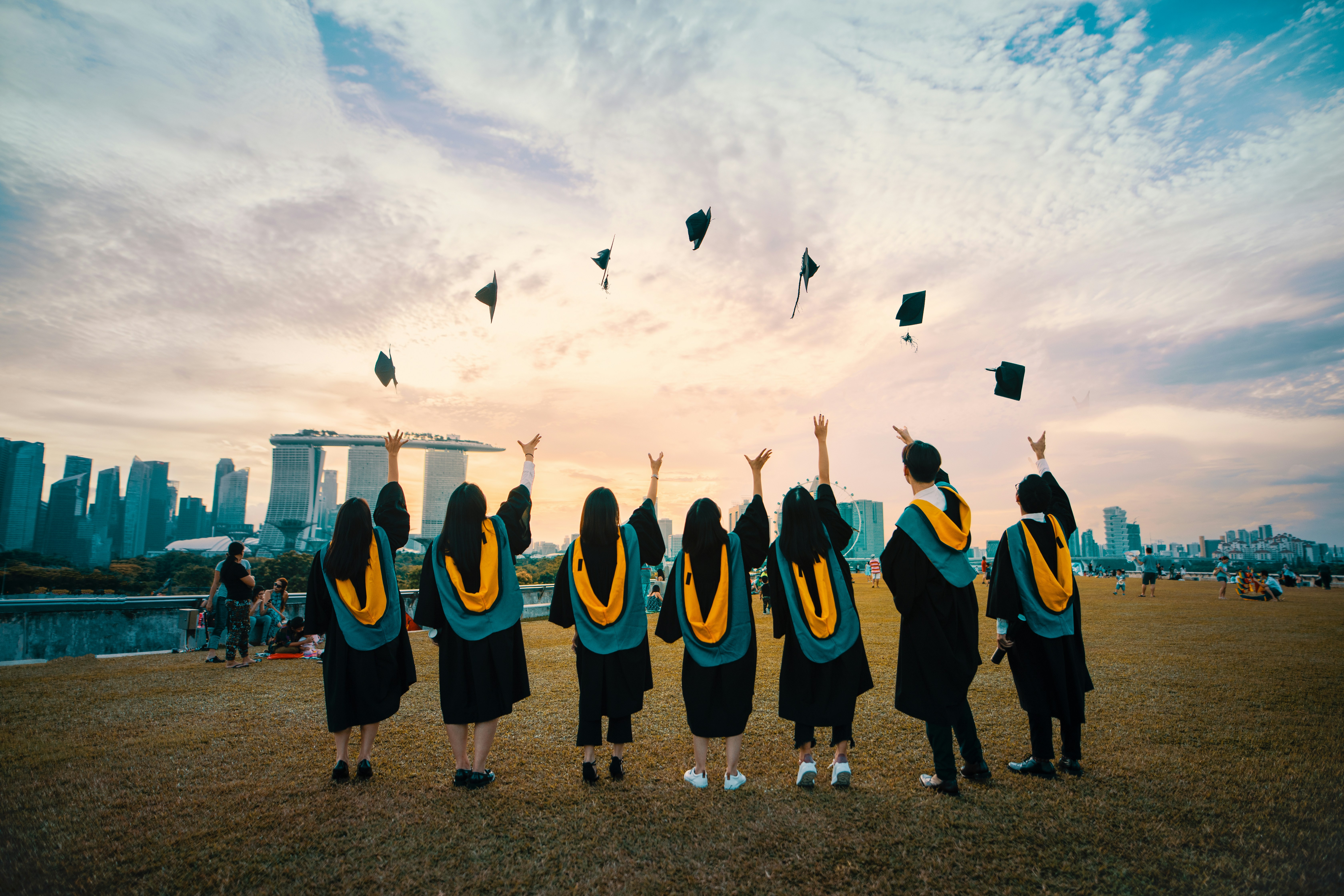 University graduates in academic gowns at a commencement ceremony