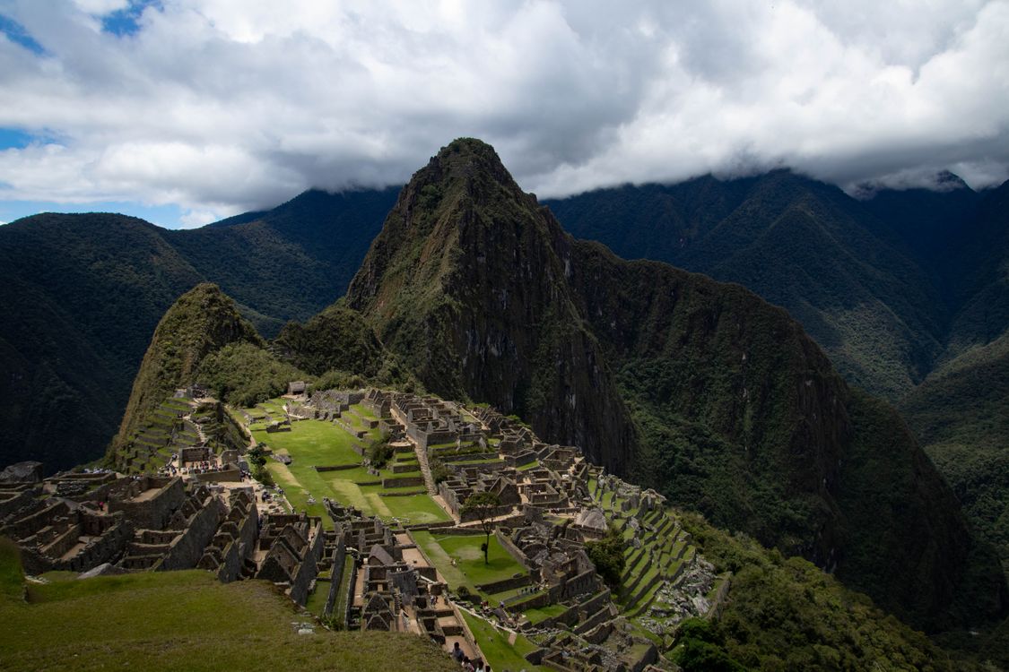 Stone terraces and ruins of Machu Picchu with a dramatic Andean mountain backdrop